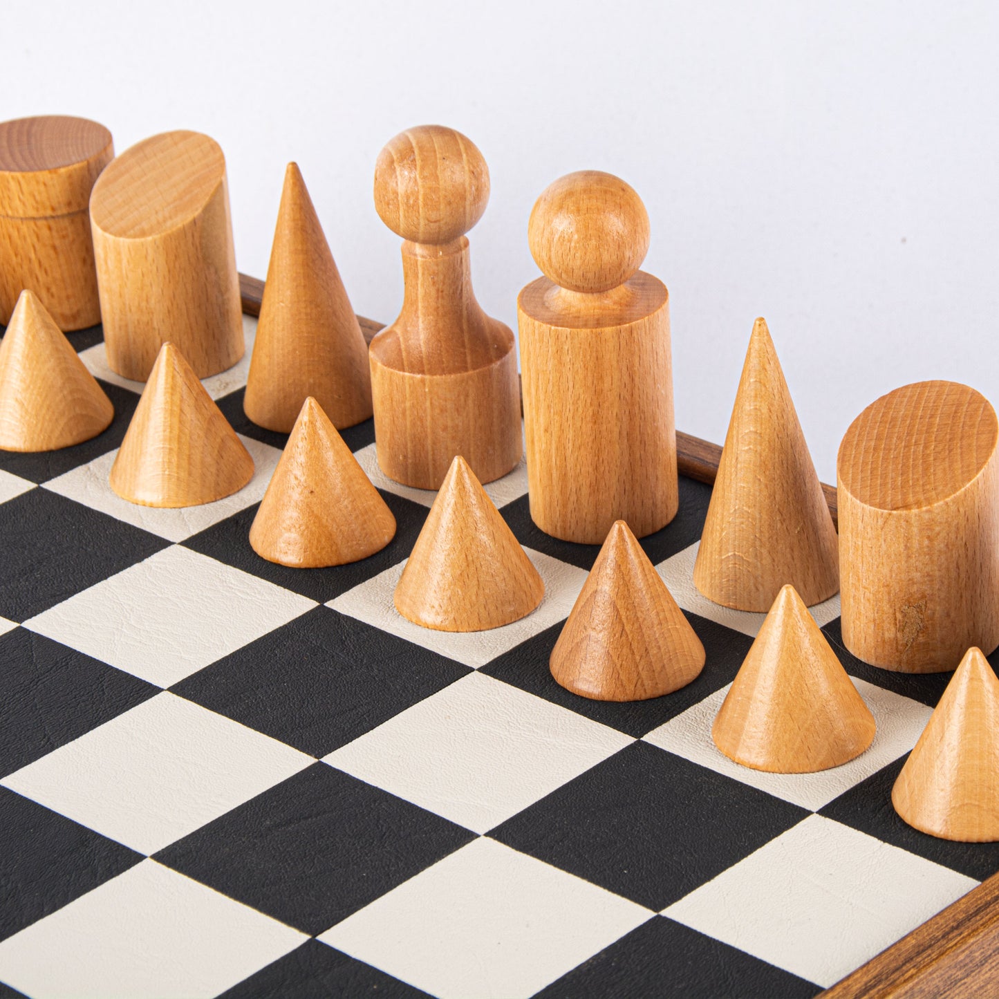 Black & White Leatherette Inlaid Chessboard With Bauhaus Style Wooden Chessmen
